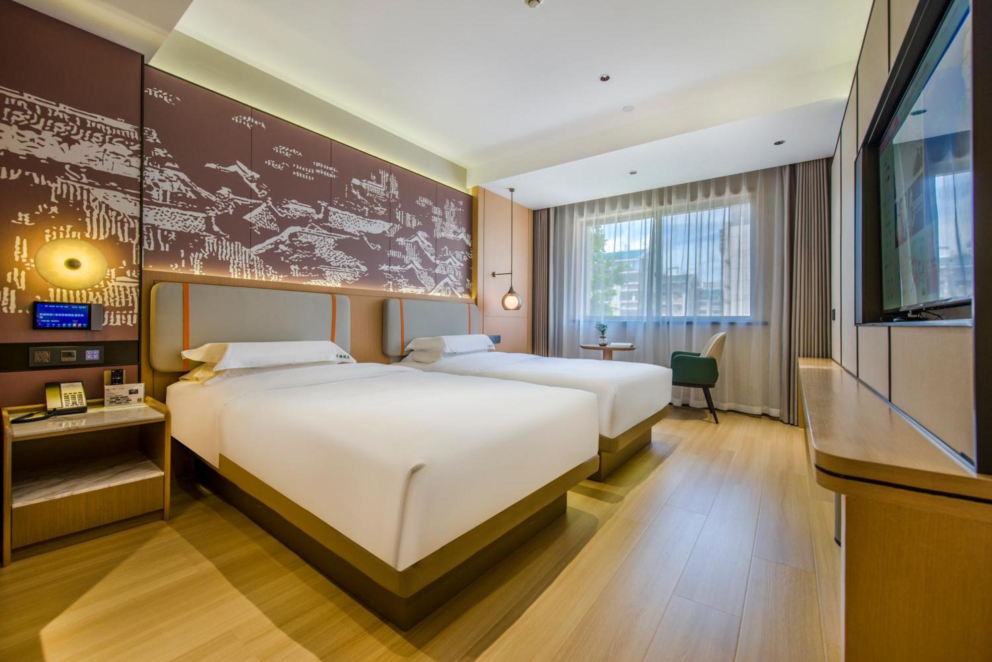 อี้อู๋ ไป่เตอ ธีม โฮเต็ล Hotel อี้วู ภายนอก รูปภาพ