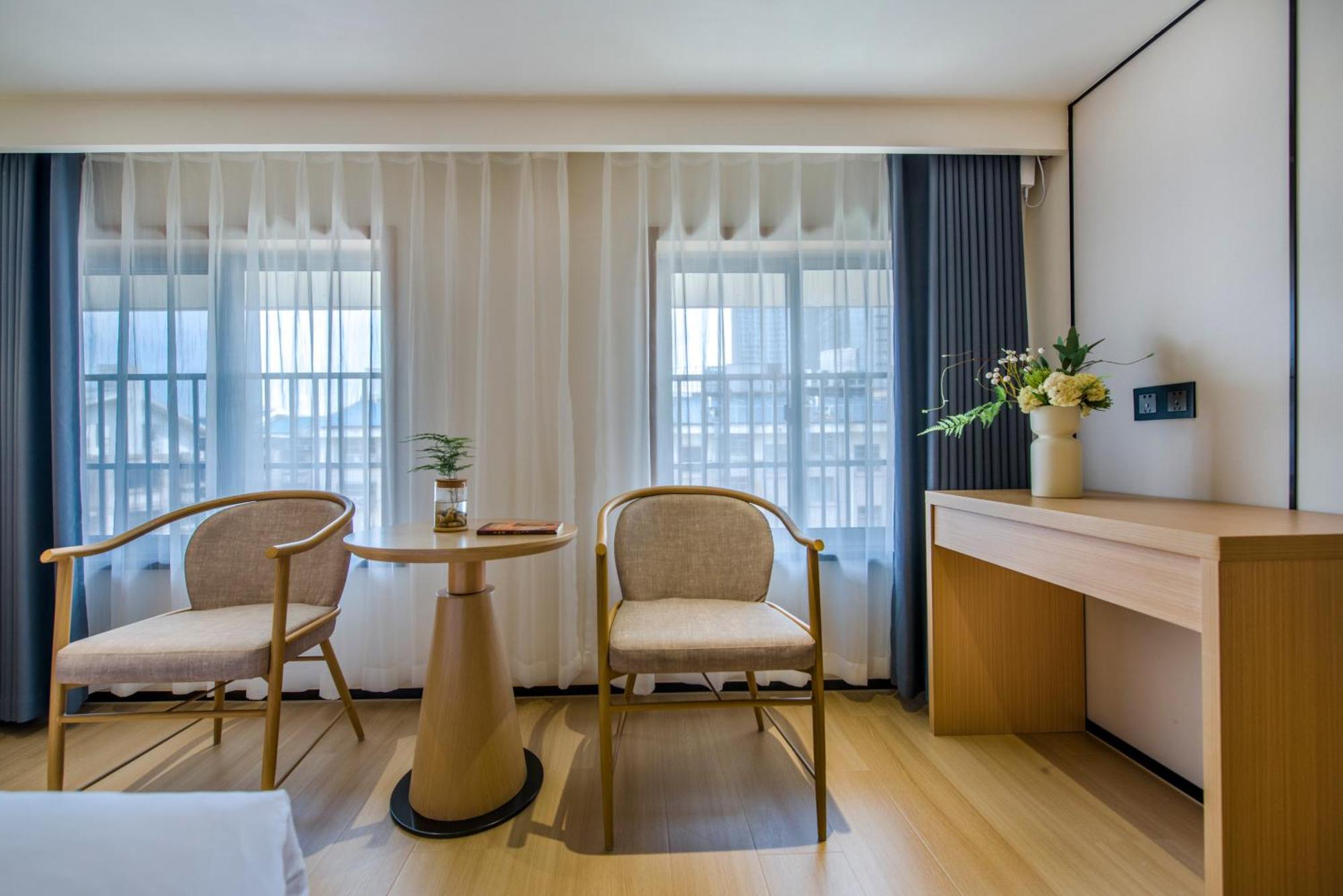 อี้อู๋ ไป่เตอ ธีม โฮเต็ล Hotel อี้วู ภายนอก รูปภาพ