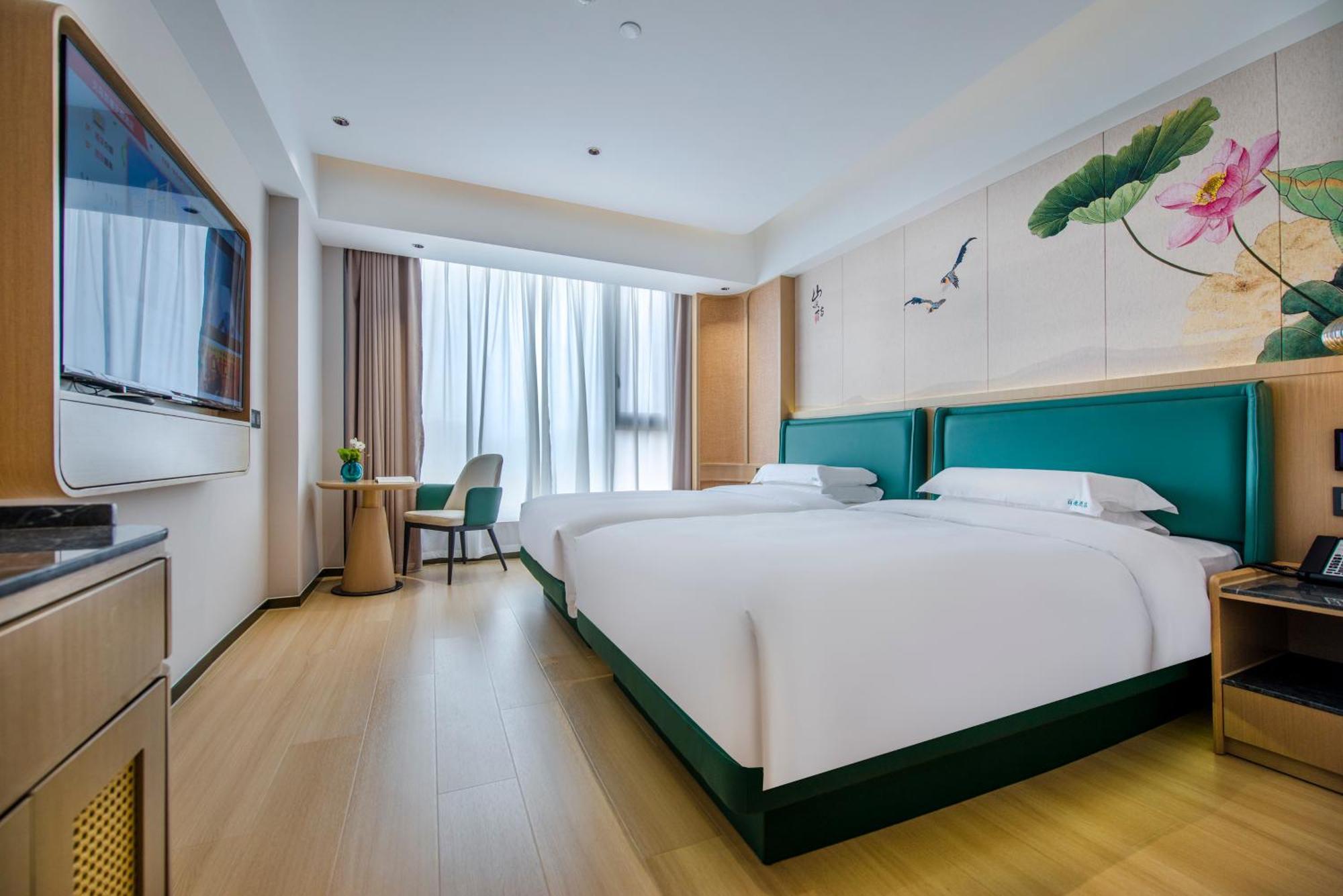 อี้อู๋ ไป่เตอ ธีม โฮเต็ล Hotel อี้วู ภายนอก รูปภาพ