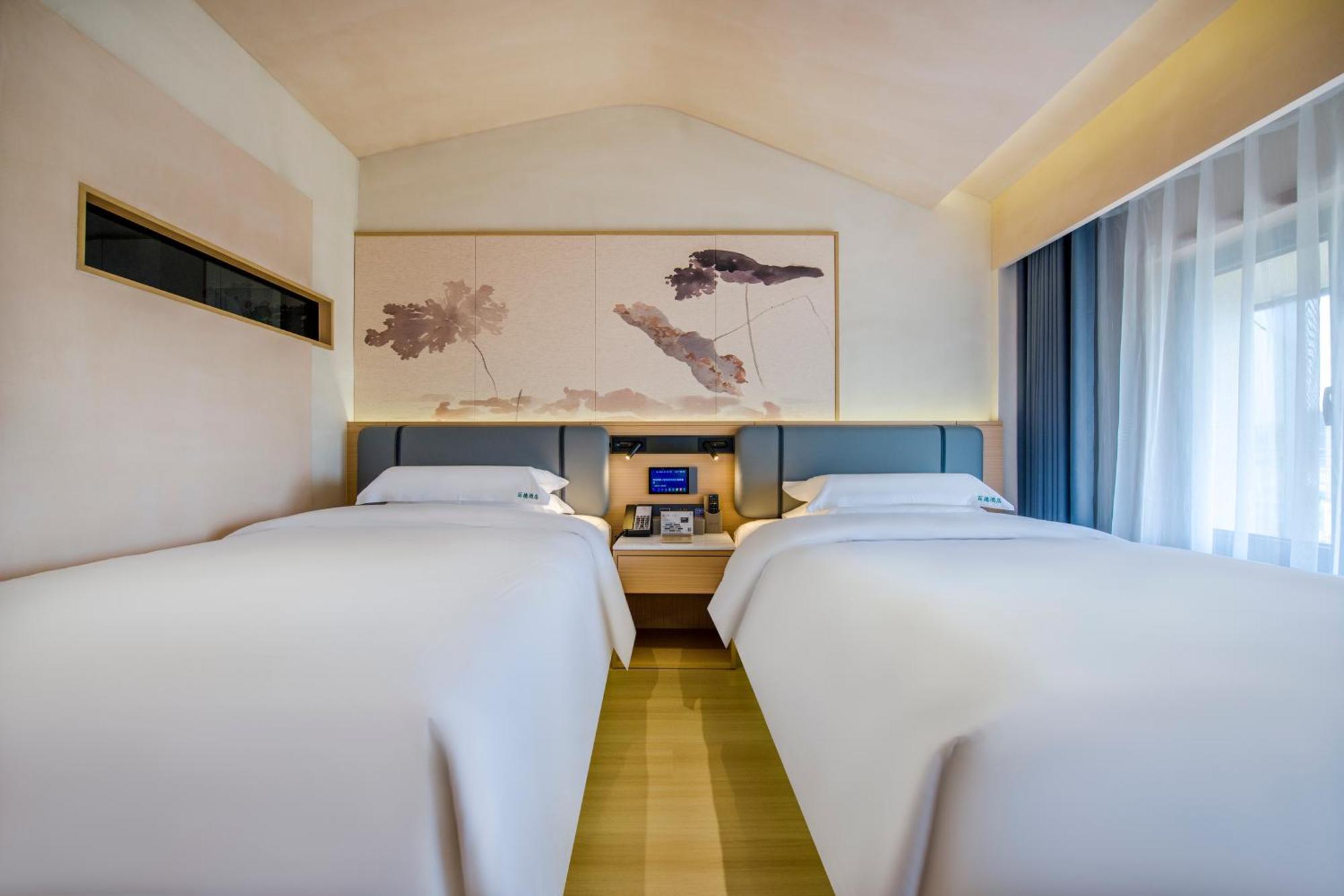 อี้อู๋ ไป่เตอ ธีม โฮเต็ล Hotel อี้วู ภายนอก รูปภาพ
